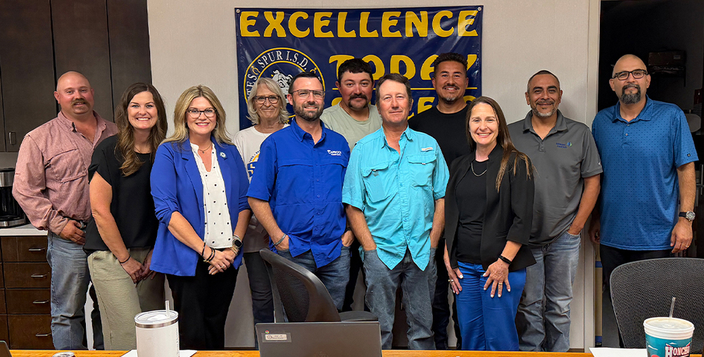 WTC President Dr. Laurie Sharp (in black on the right )with the Spur ISD Board of Trustees at their board meeting on September 28.