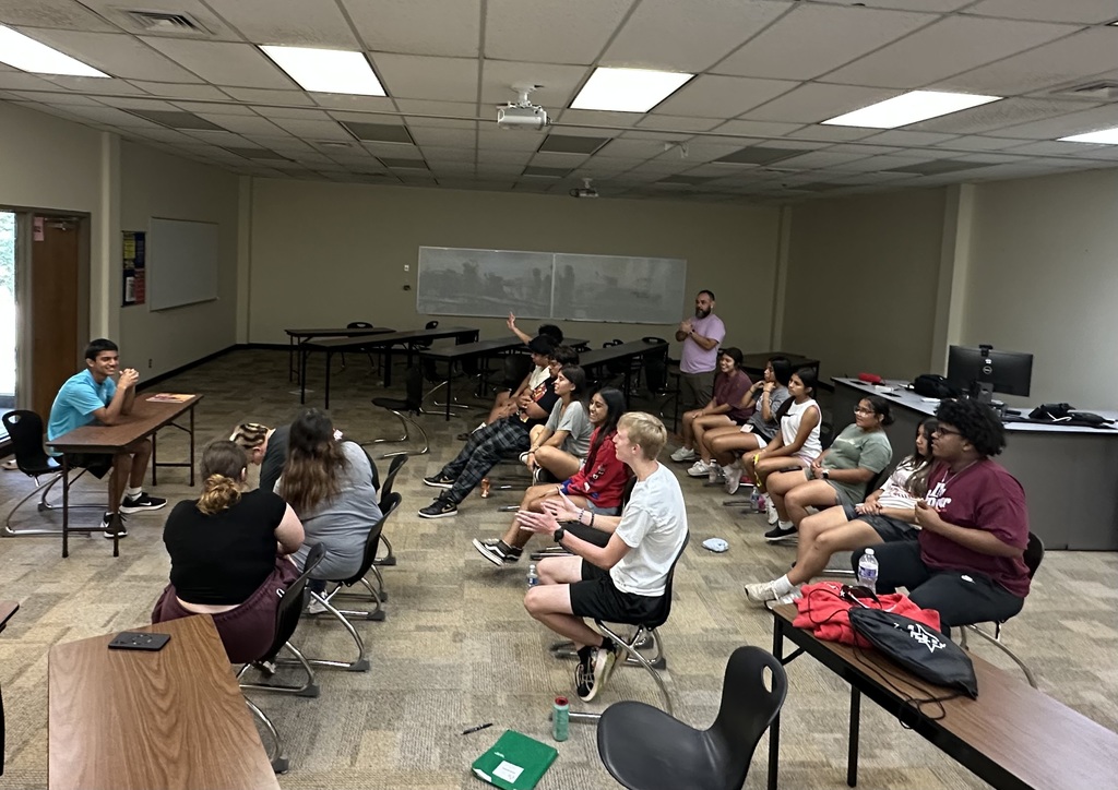Upward Bound students having a mock press conference. The "expert" at the front has to figure out what the crisis is.