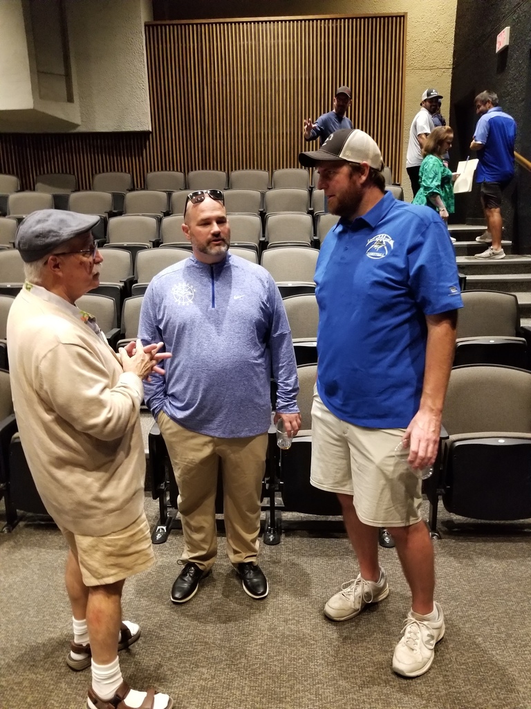 Ray Newton, Matt Hardy, and Nathan Purswell chat after opening session.