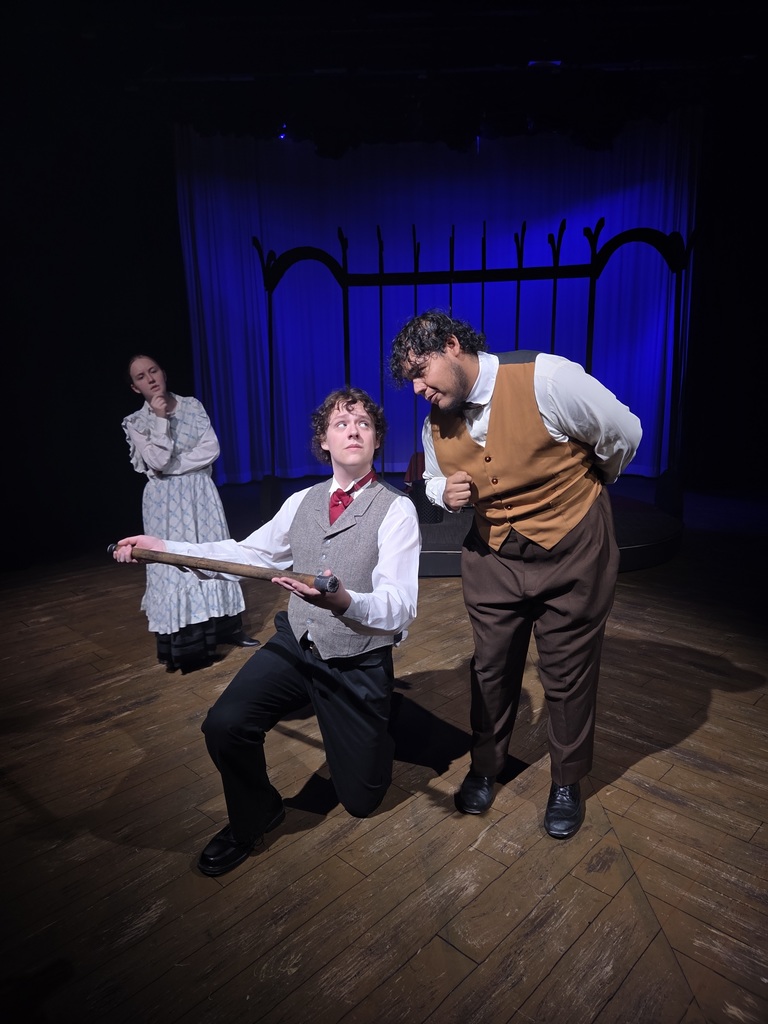 JaeAnna Lockeby Landers, Evan Jackson, and Omar Isaac Ruacho rehearse a scene from the play.