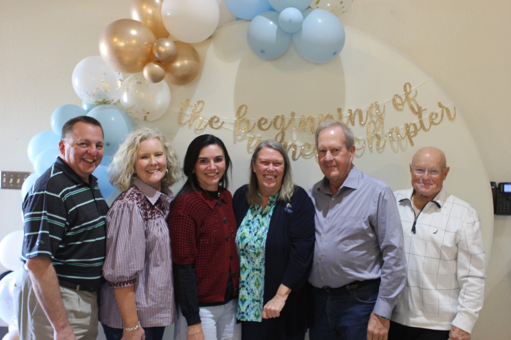 Dr. Beebe poses with the Board of Trustees.