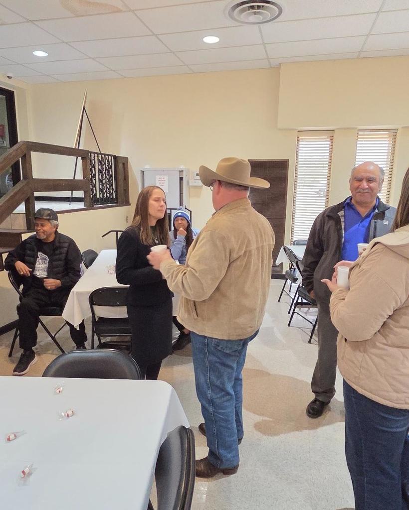 Dr. Sharp talks with Dr. Scates.