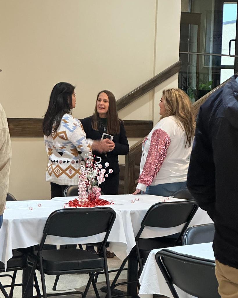 Dr. Sharp visits with SSS employees.