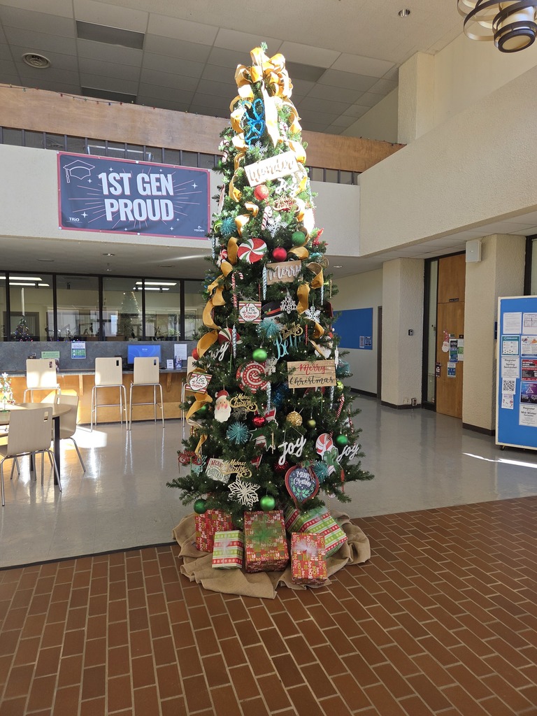 A twelve-foot Christmas tree stands tall in the Student Center lobby.