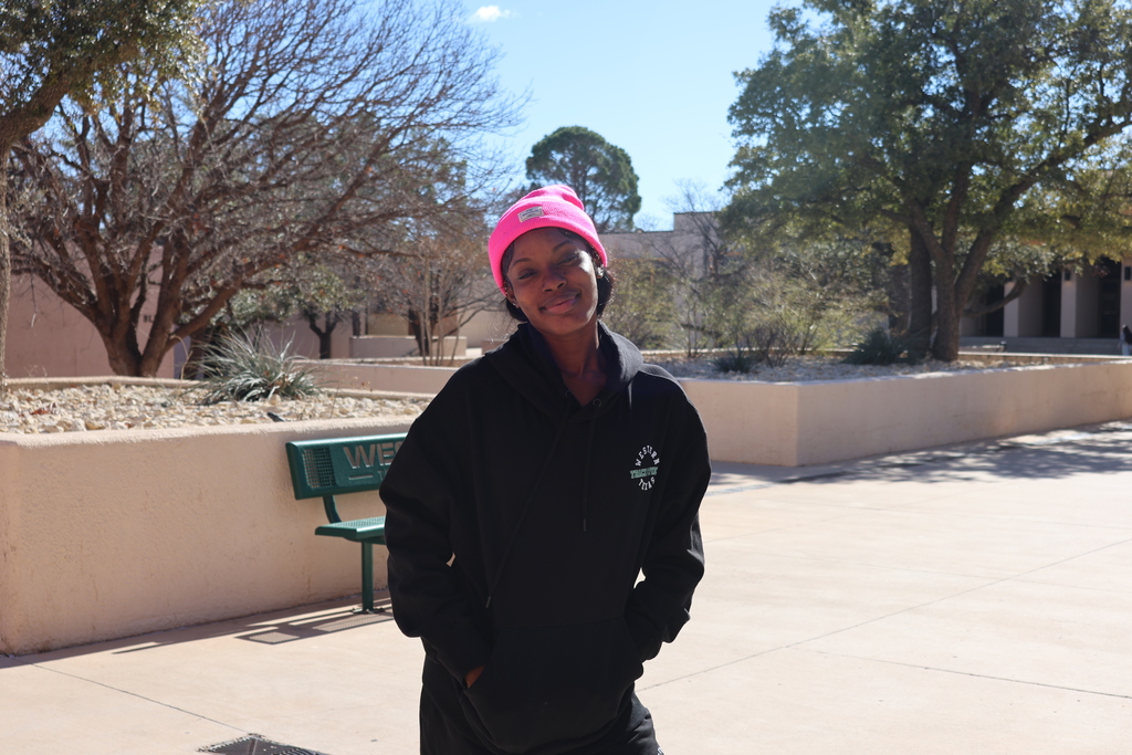 Western Texas College student standing near campus walkway on the first day of classes.