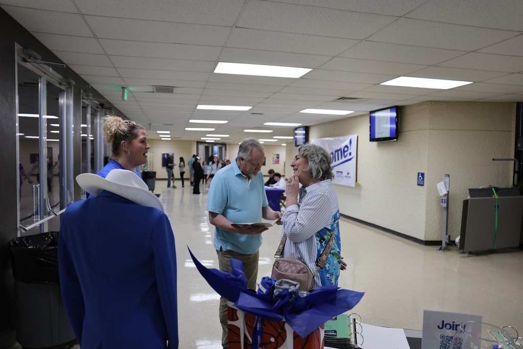 People viewing old WTC yearbooks