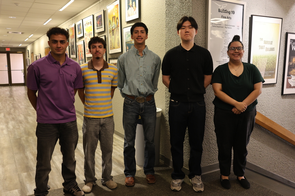 Five students standing in hallway near Fine Arts signage during campus event at Western Texas College.
