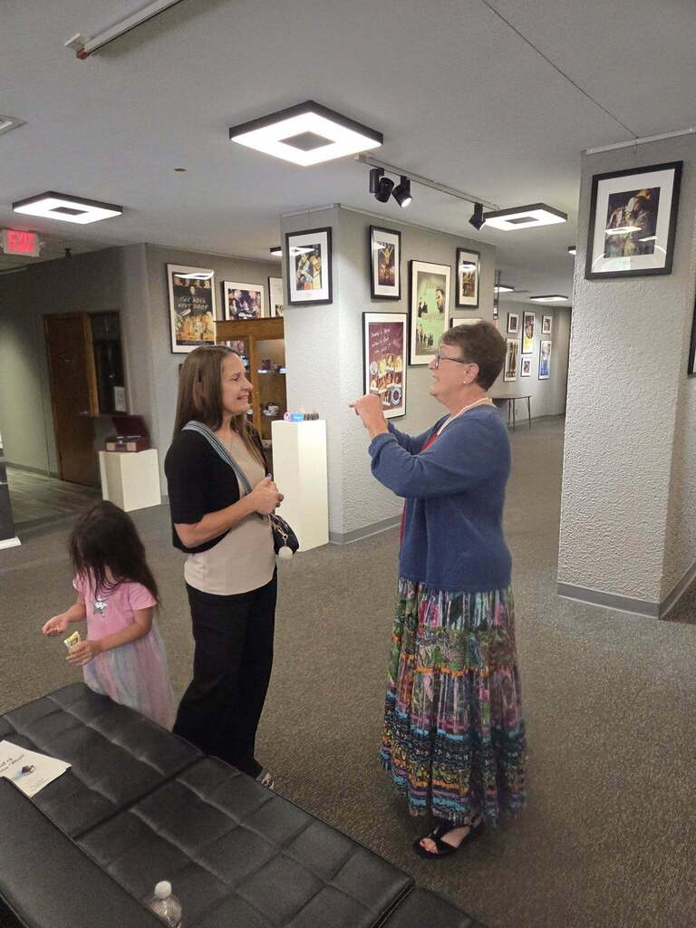 Vena Genuchi-Alesio speaking to WTC President Dr. Laurie Sharp