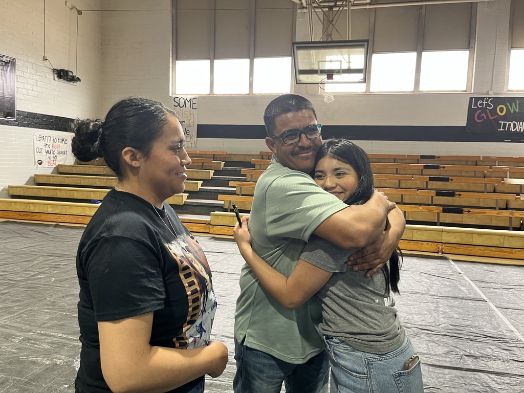 Future Westerner student hugs family member during Morton High School signing event celebrating commitment to Western Texas College.