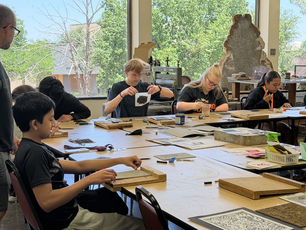 Students create printmaking projects and review artwork during a hands-on art class at Western Texas College.