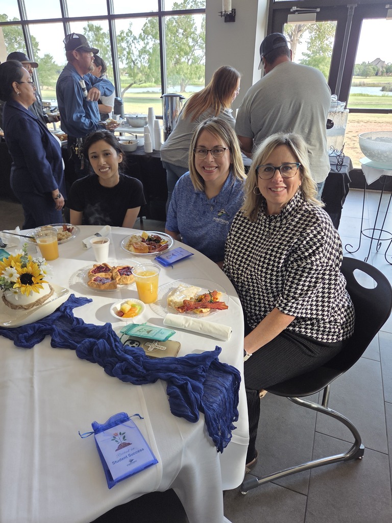 Three Western Texas College employees enjoy breakfast together during the Welcome Back Brunch.