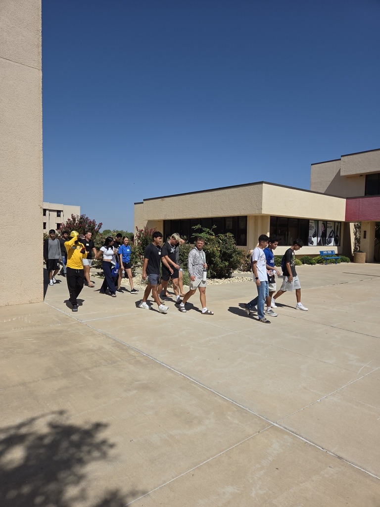 WTC students walk together across campus during New Student Orientation.