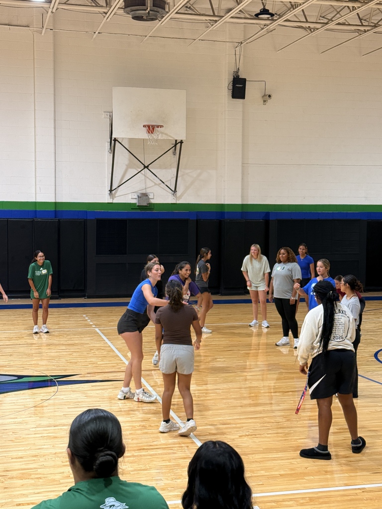 WTC students interact during a group activity in the campus gym.