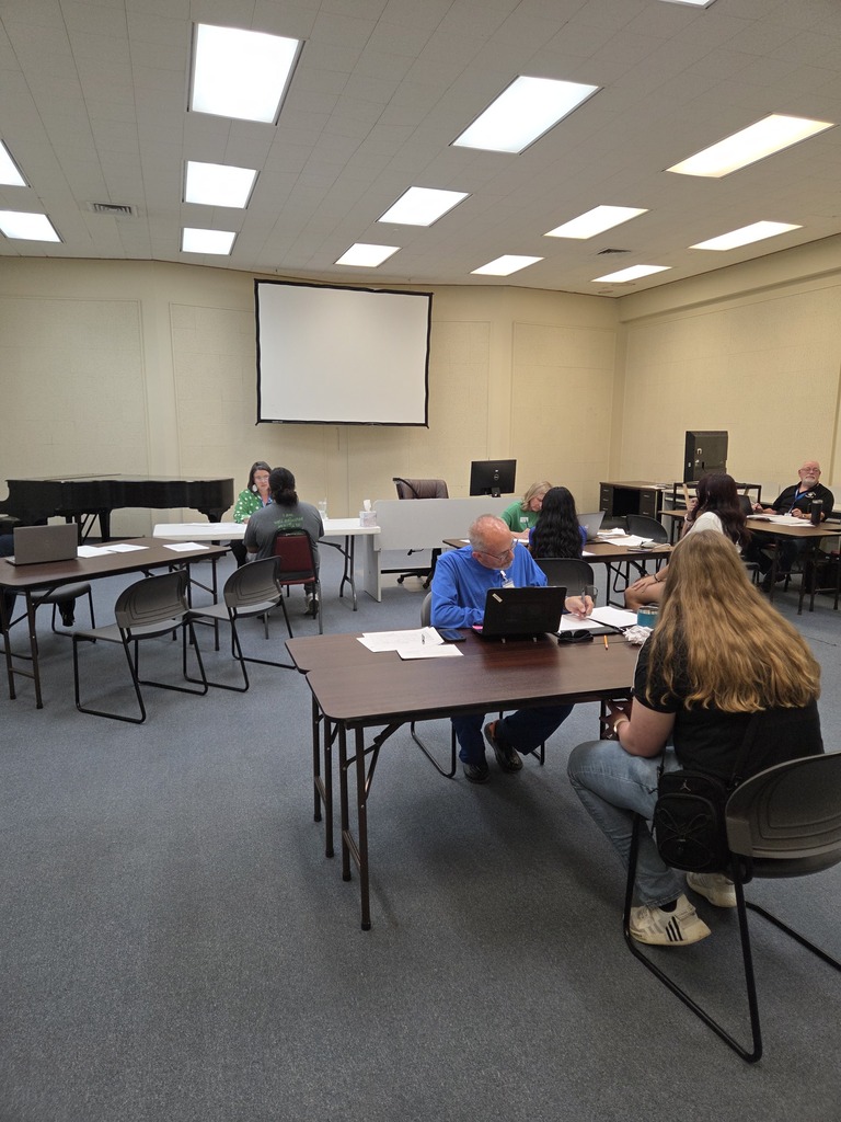 WTC employees assist students with Fall Registration in a campus classroom.
