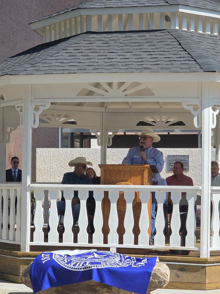 A speaker addresses the crowd from a gazebo during the Scurry County 150th anniversary celebration.
