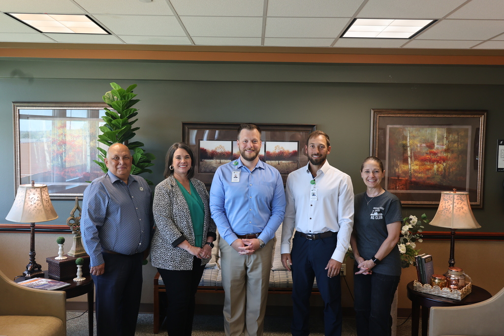 Five representatives from Western Texas College and Cogdell Memorial Hospital stand together during a partnership announcement.