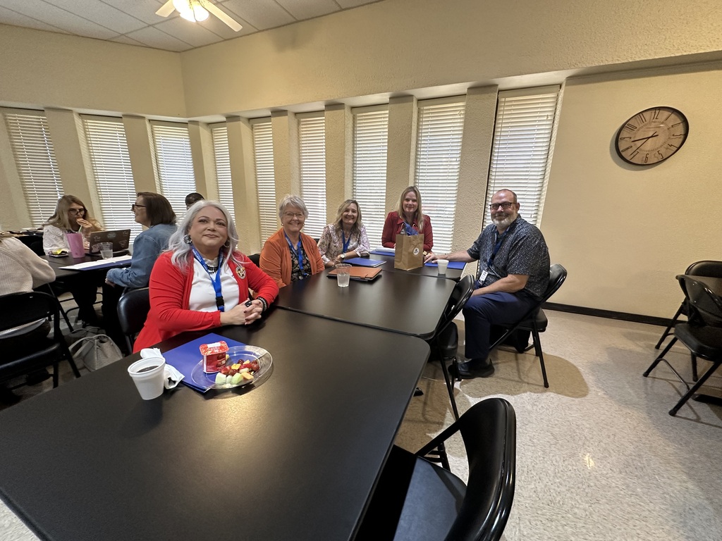 Area school district employees smile together during the 2026 Annual Education Partnership Summit.