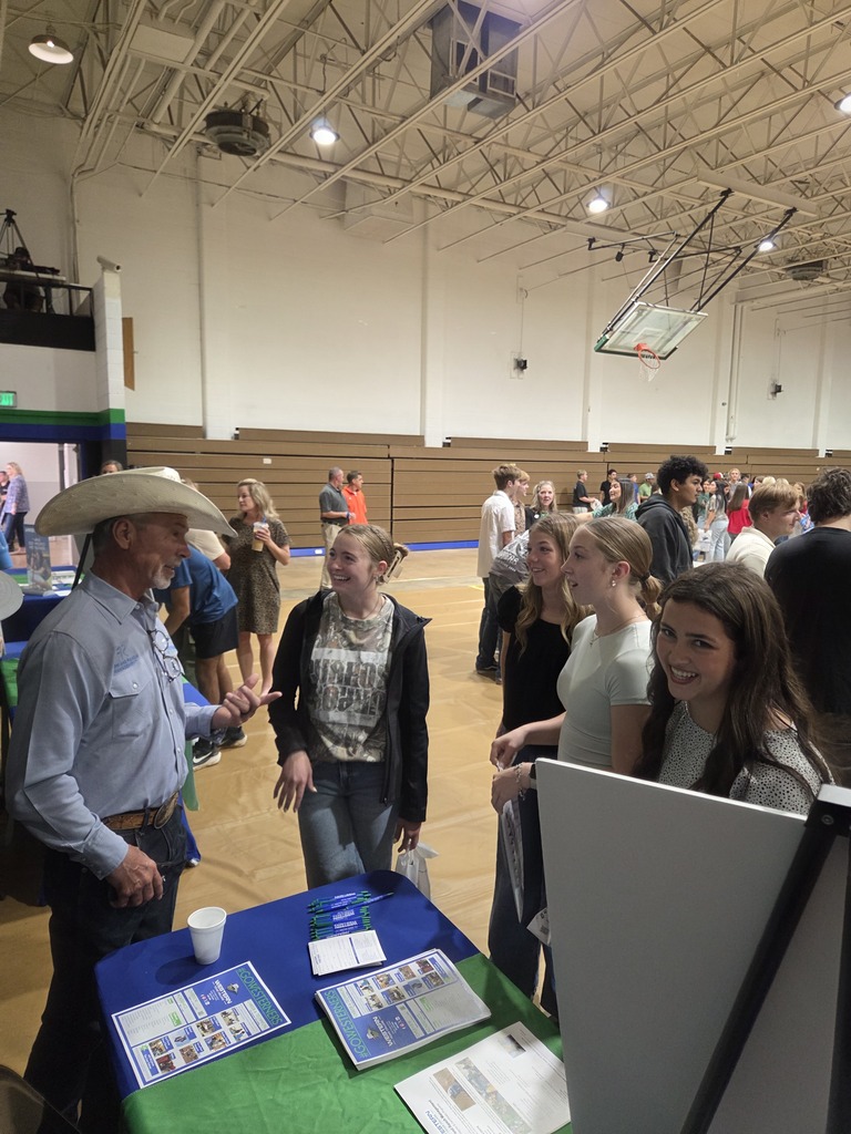 A Western Texas College representative speaks with students about college programs during the WTC College Fair.