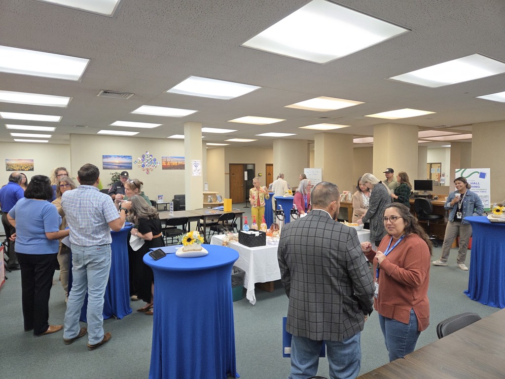1. WTC employees and community members mingle during Coffee with the Chamber in the Resource Center.