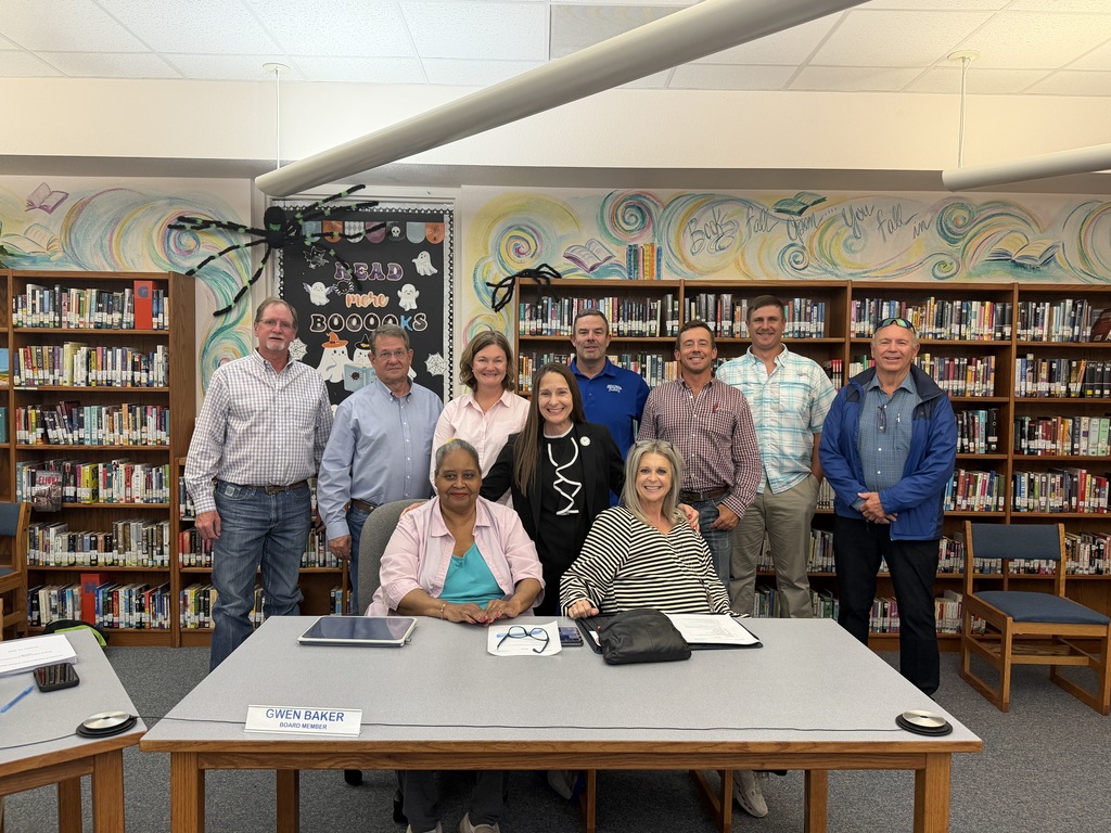 WTC President Dr. Laurie Sharp (center, in black) with the Stamford ISD Board of Trustees.