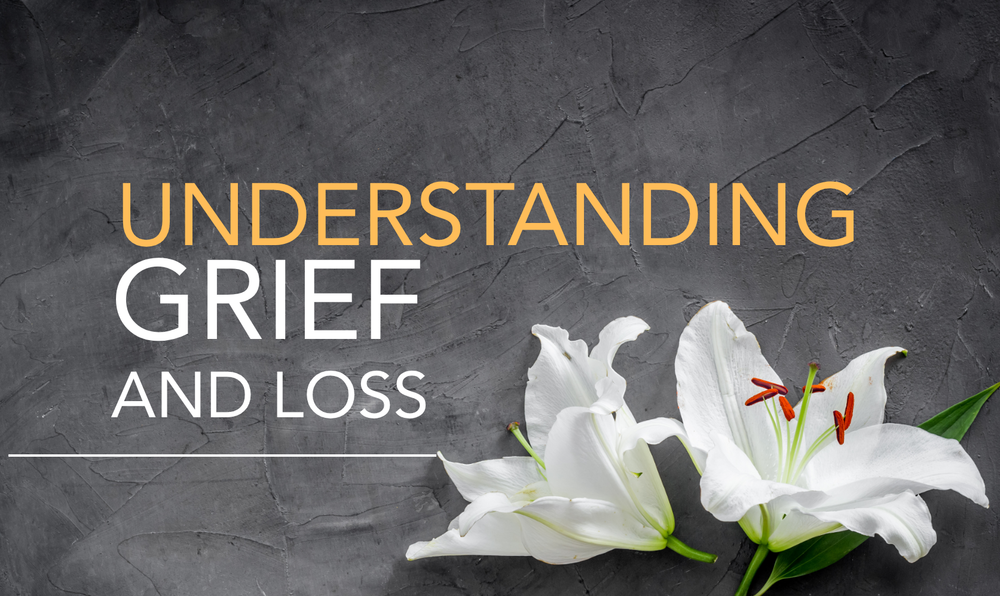 Understanding Grief and Loss with white flowers