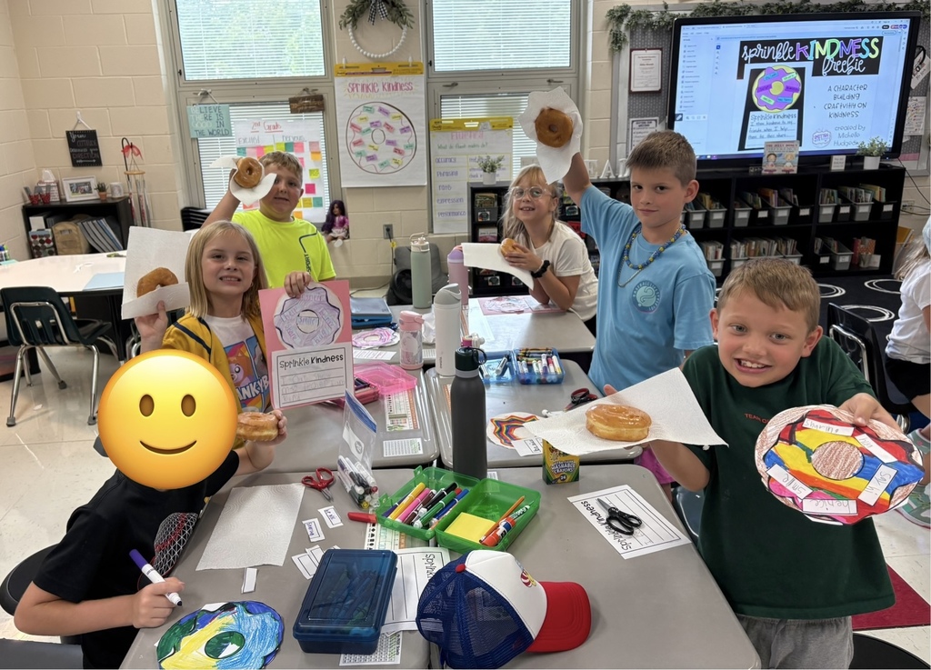Students enjoying donuts