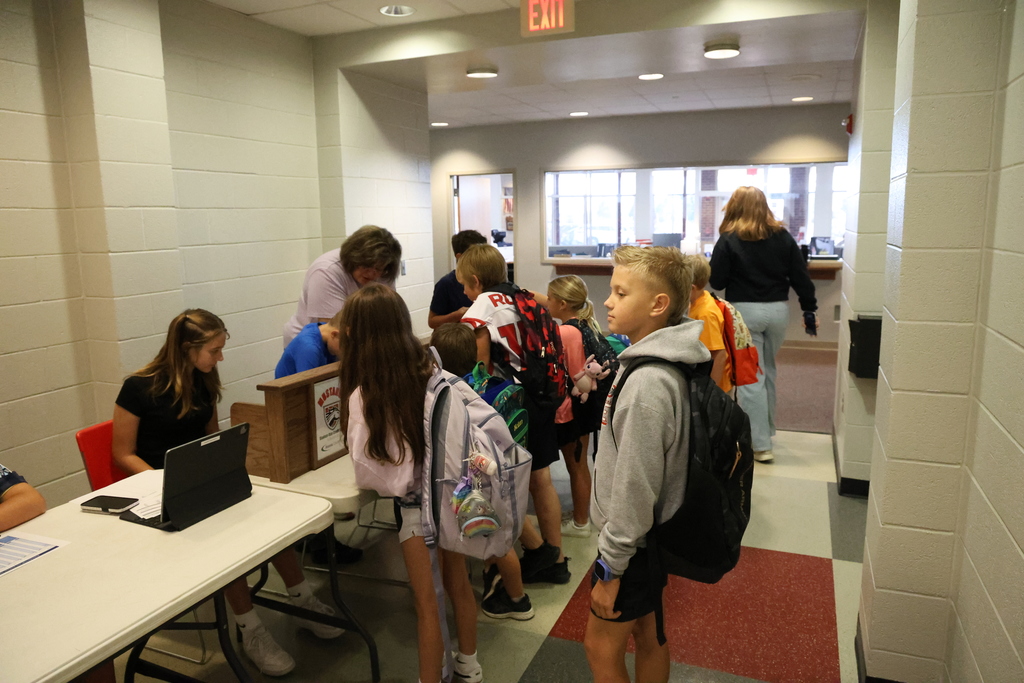 Students waiting in line for credit union