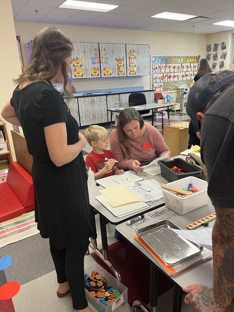 Students and parents working on projects