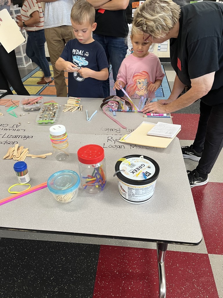 Students and parents working on projects