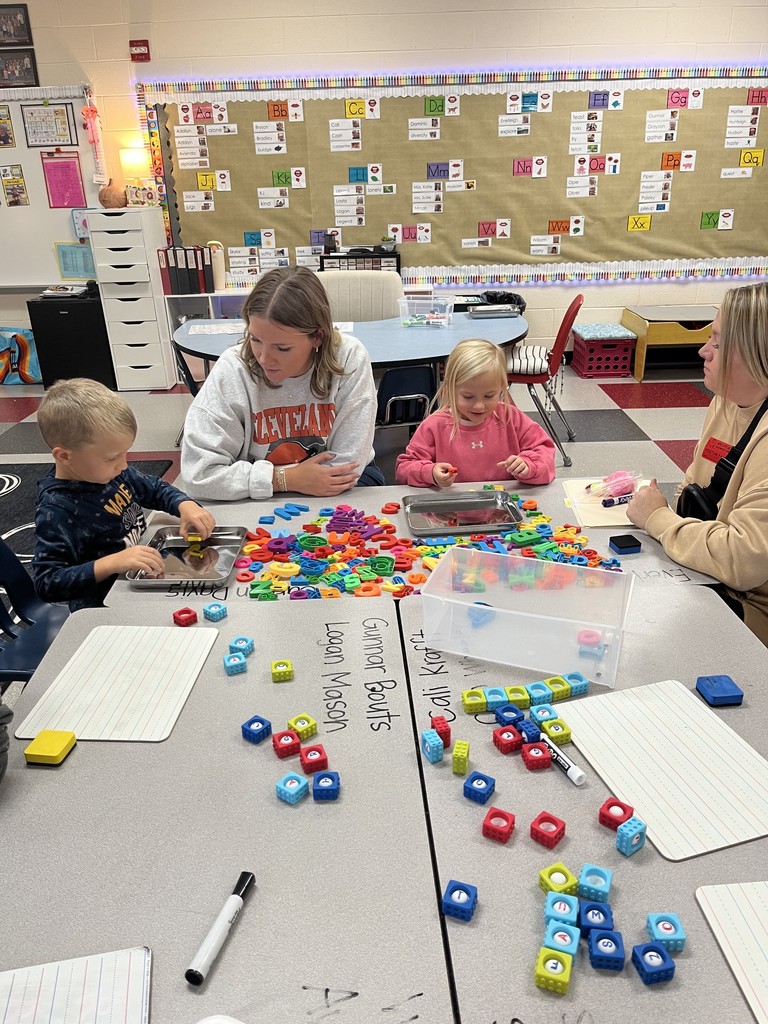 Students and parents working on projects