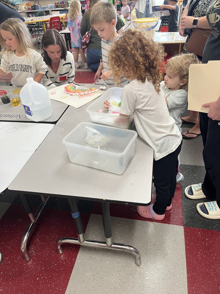 Students and parents working on projects