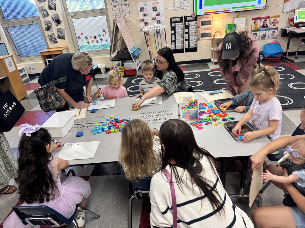 Students and parents working on projects