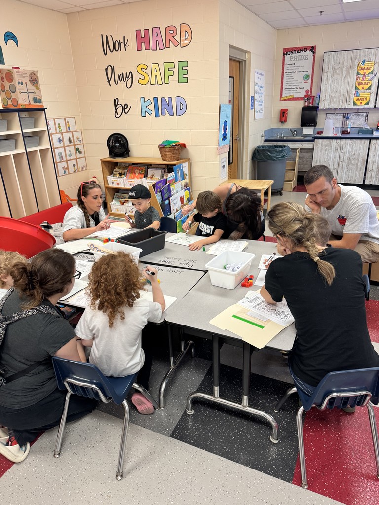 Students and parents working on projects