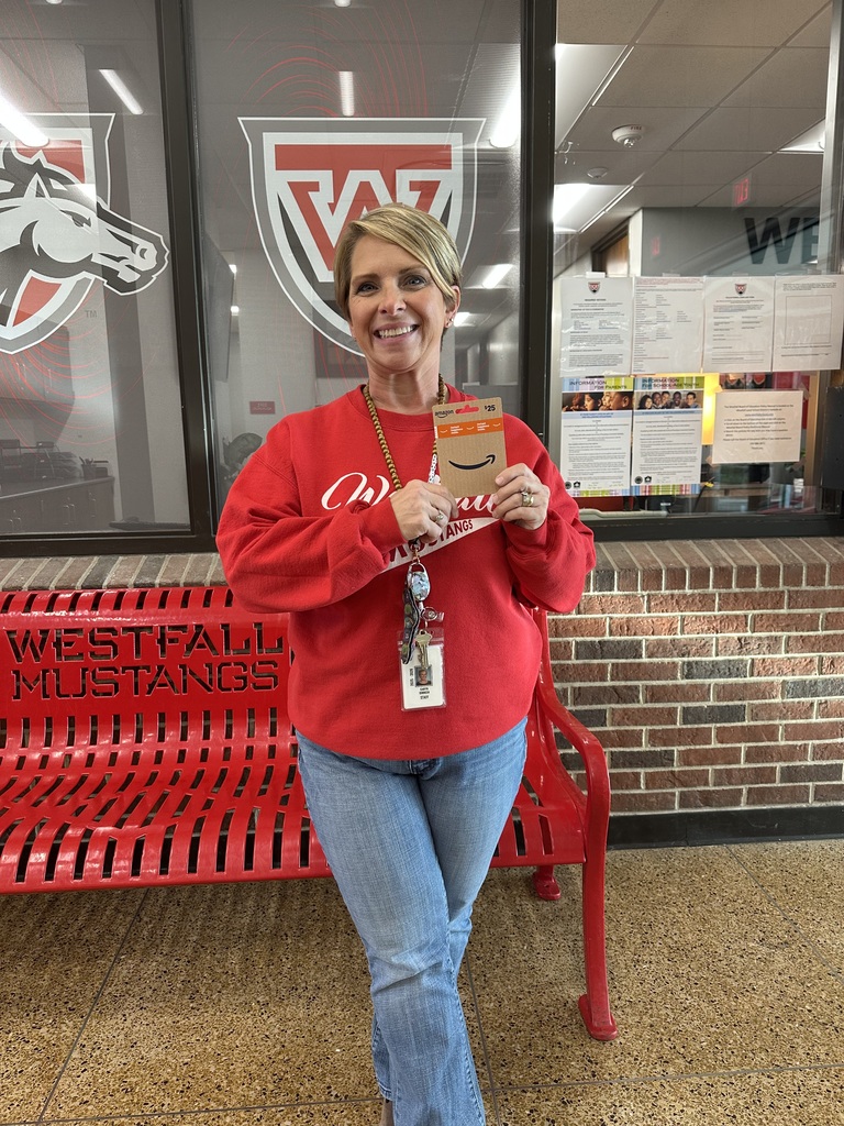 Caryn Dinneen holding an Amazon Gift Card