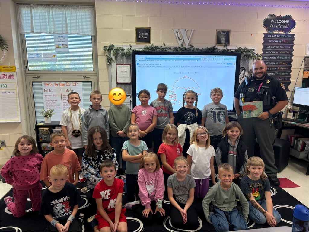 Group photo of students with Deputy Freeman
