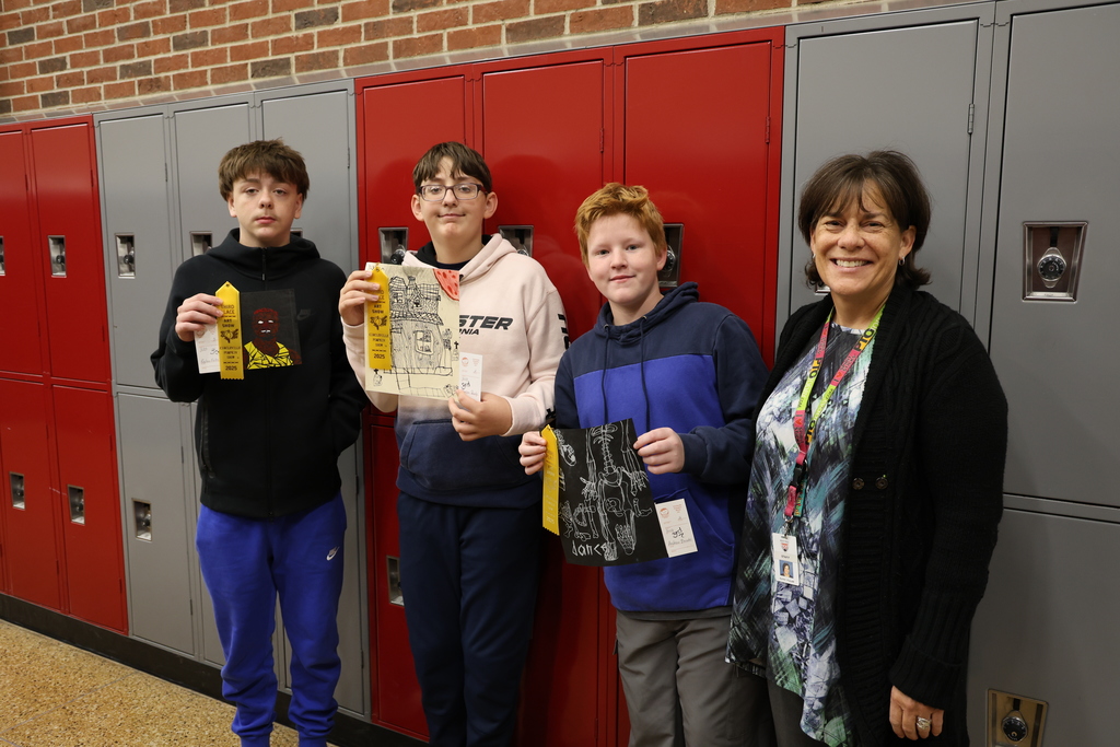 Group photo of students with art teacher, Mrs. Fuller
