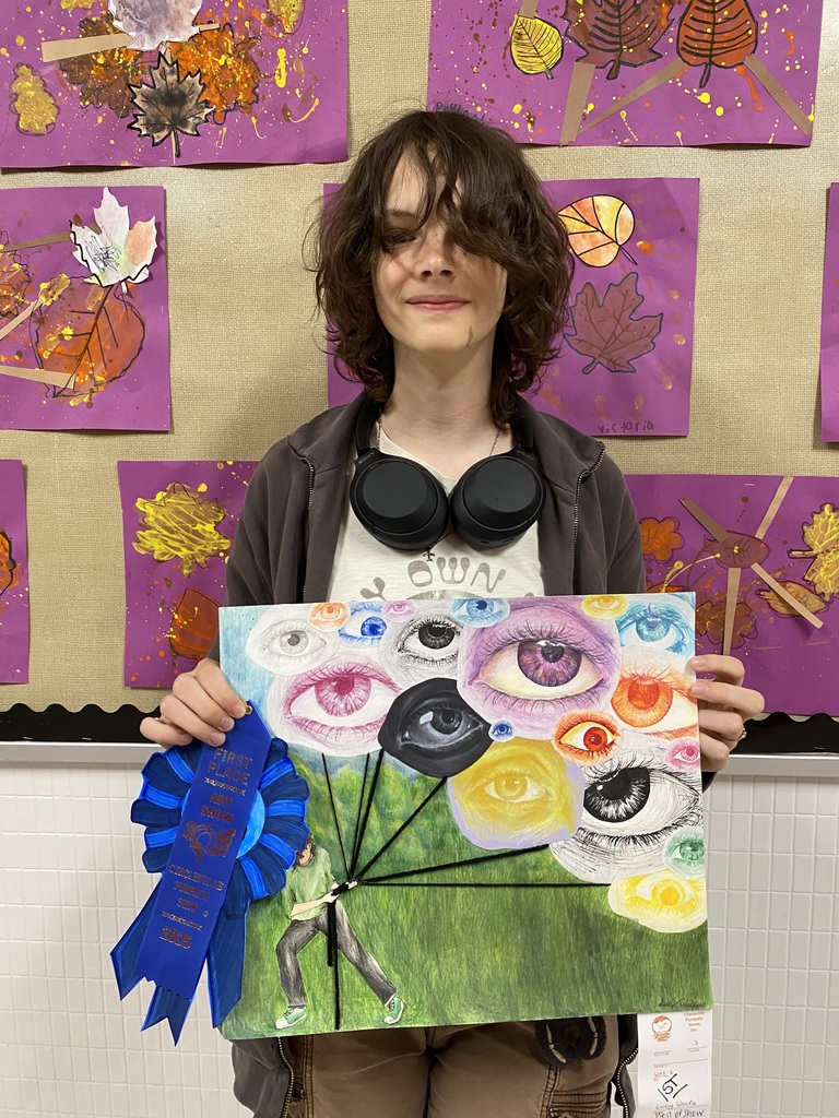 Lucy Wolfe with artwork