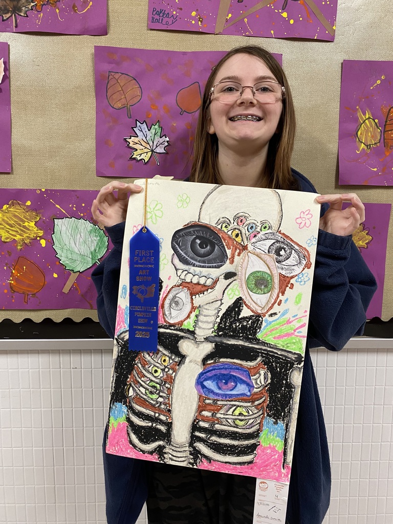 Amanda Smith with her artwork