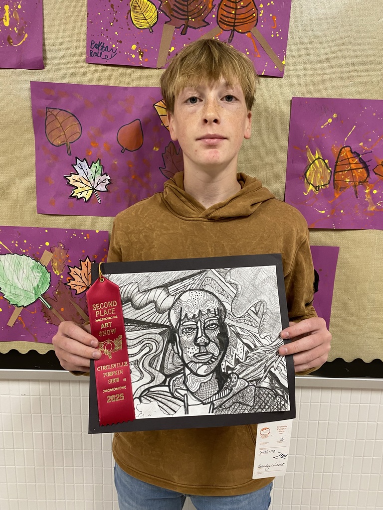 Brody Scott with his artwork