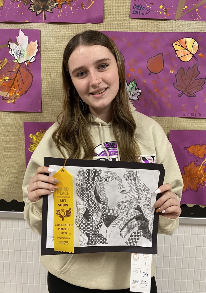 Tessa Poling with her artwork