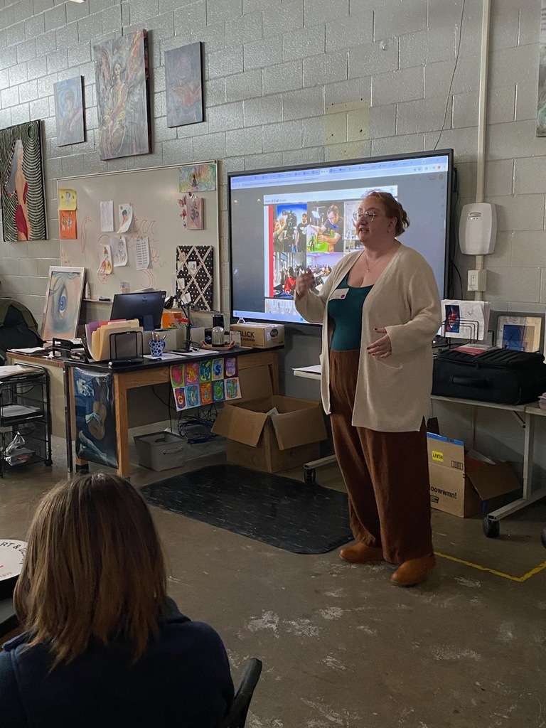 Presenter speaking to students