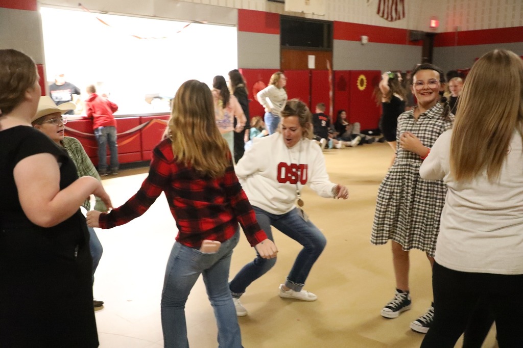 Students dancing in gymnasium