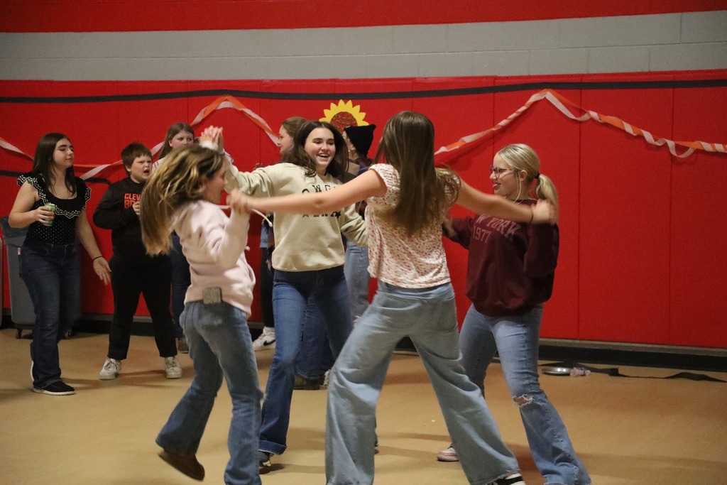 Students dancing in gymnasium