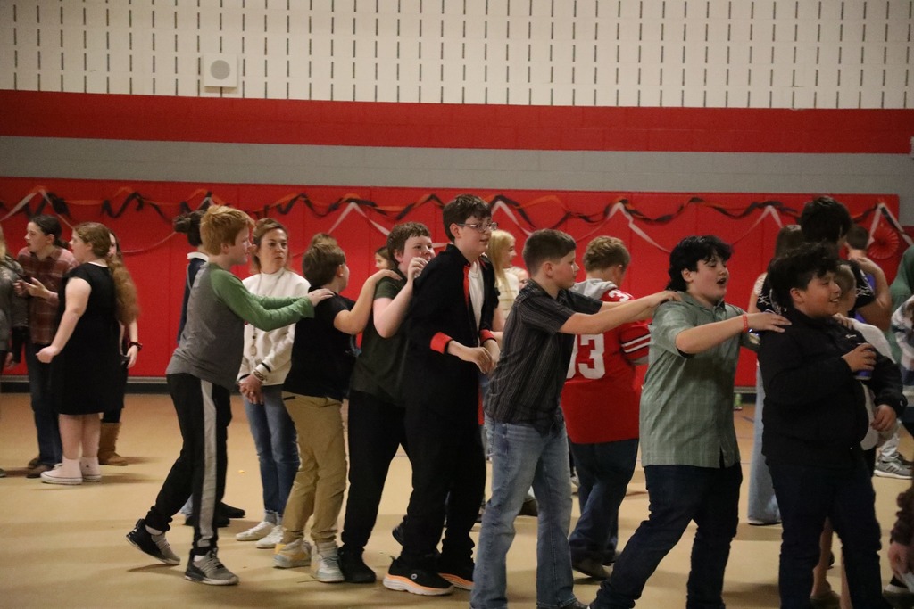 Students dancing in gymnasium