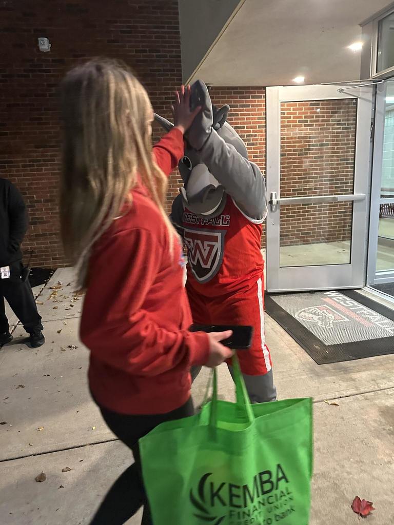 Marty the Mustang with student