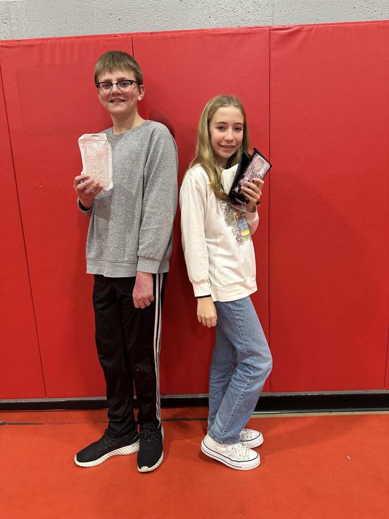 students holding treat bags