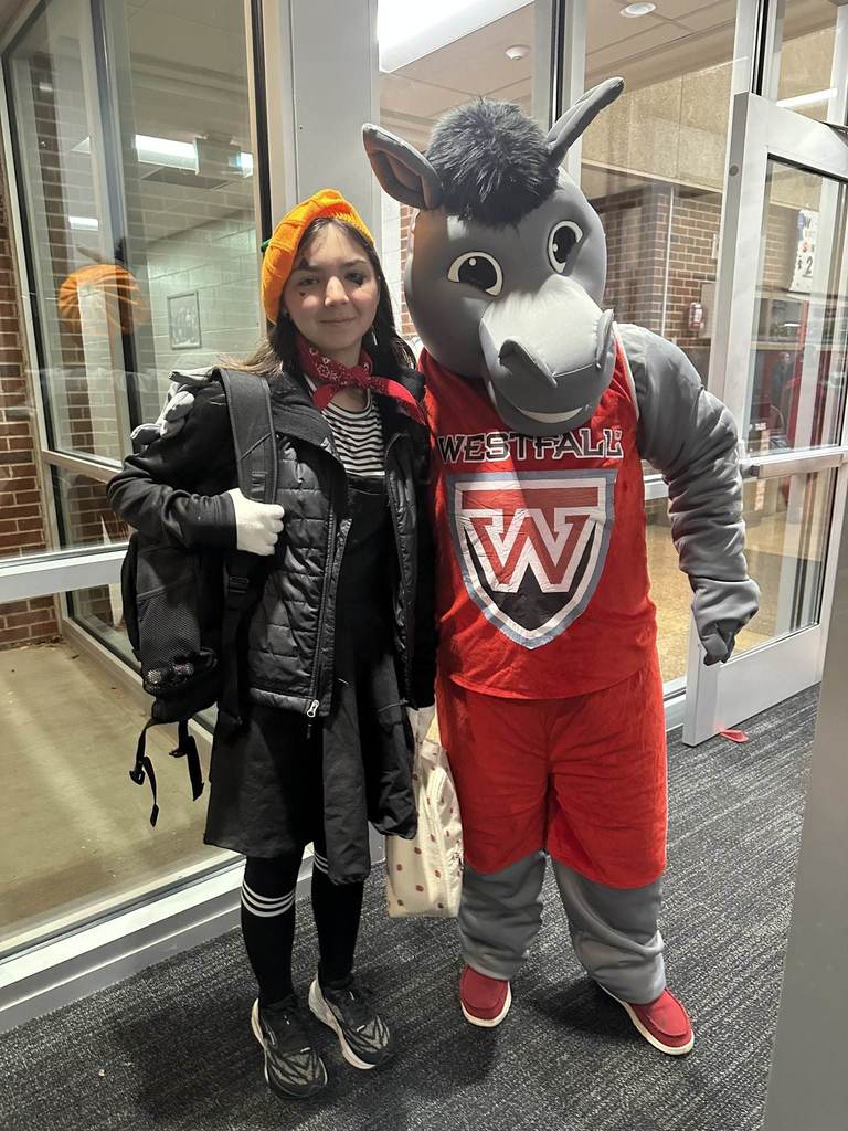 Marty the Mustang with student