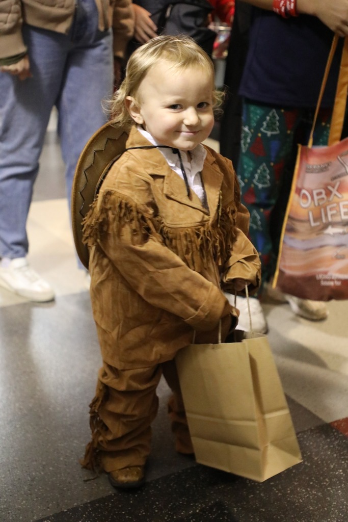 Students dressed up in costume for trunk or treat