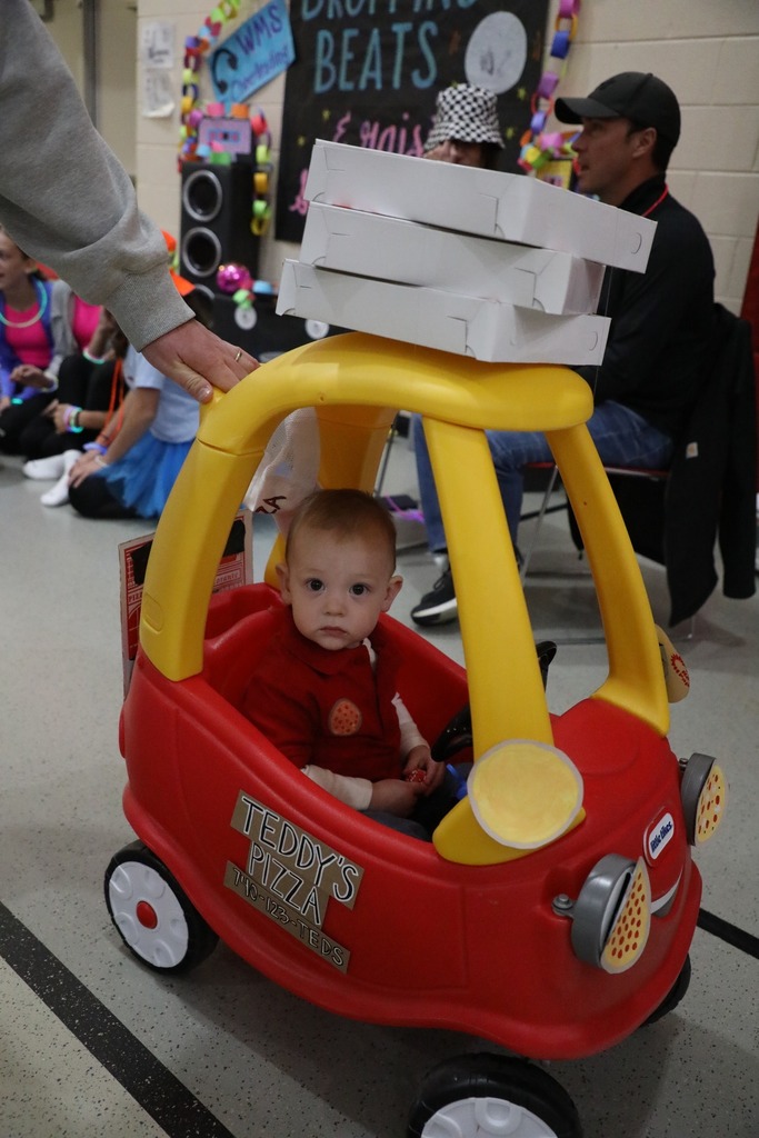 Students dressed up in costume for trunk or treat