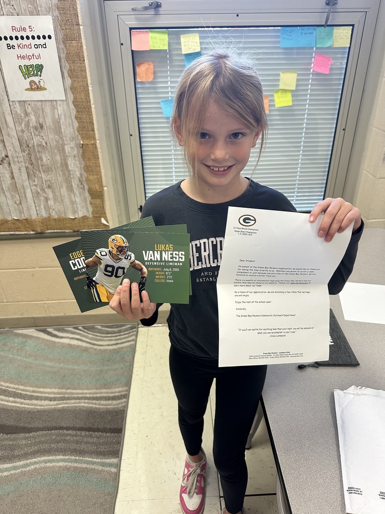 Madyson with her Green Bay Packers gifts and letter
